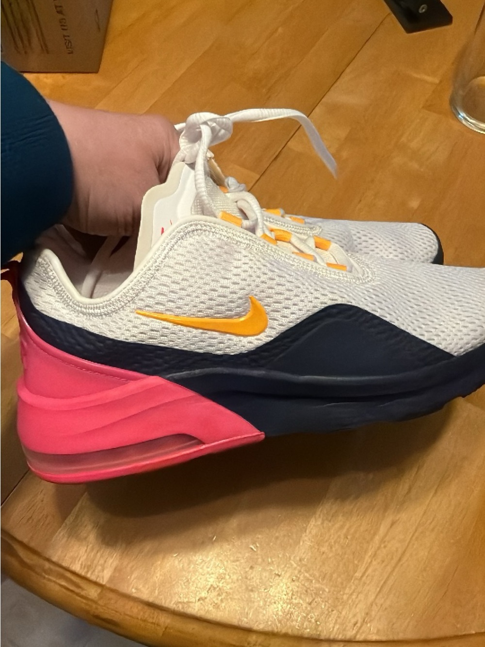 Nike White Athletic Sneakers with Navy Midsole, Pink Heel & Yellow Swoosh